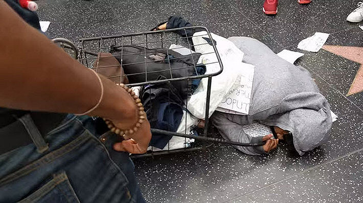 Homeless Woman Beaten By Clinton Activists