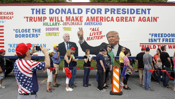 Supporters Stand In Like To Attend Trump 100 Day Rally