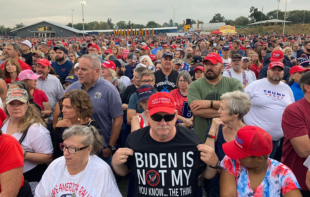 Trump fans T-shirt sports Biden IS NOT My President at Trump Save America Rally Des Moines IA